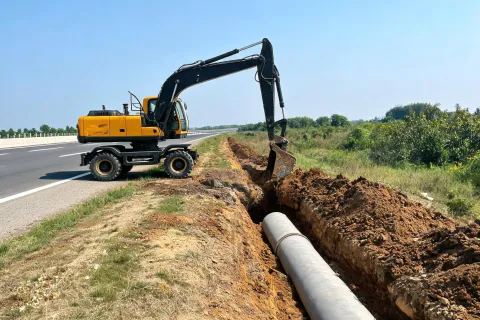 Wheel excavator trenching drainage